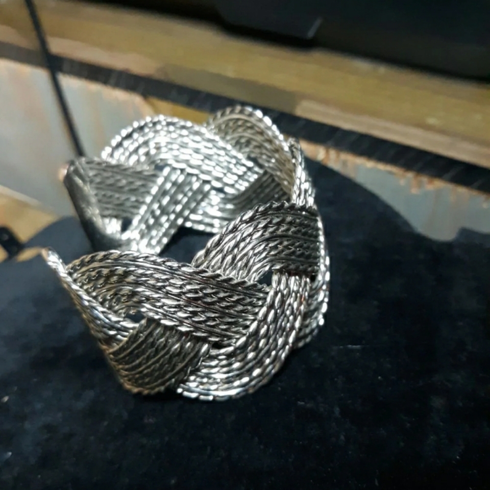 silver knotted multi strand cuff bracelet.